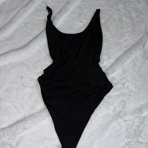 Naked wardrobe one piece bathing suit